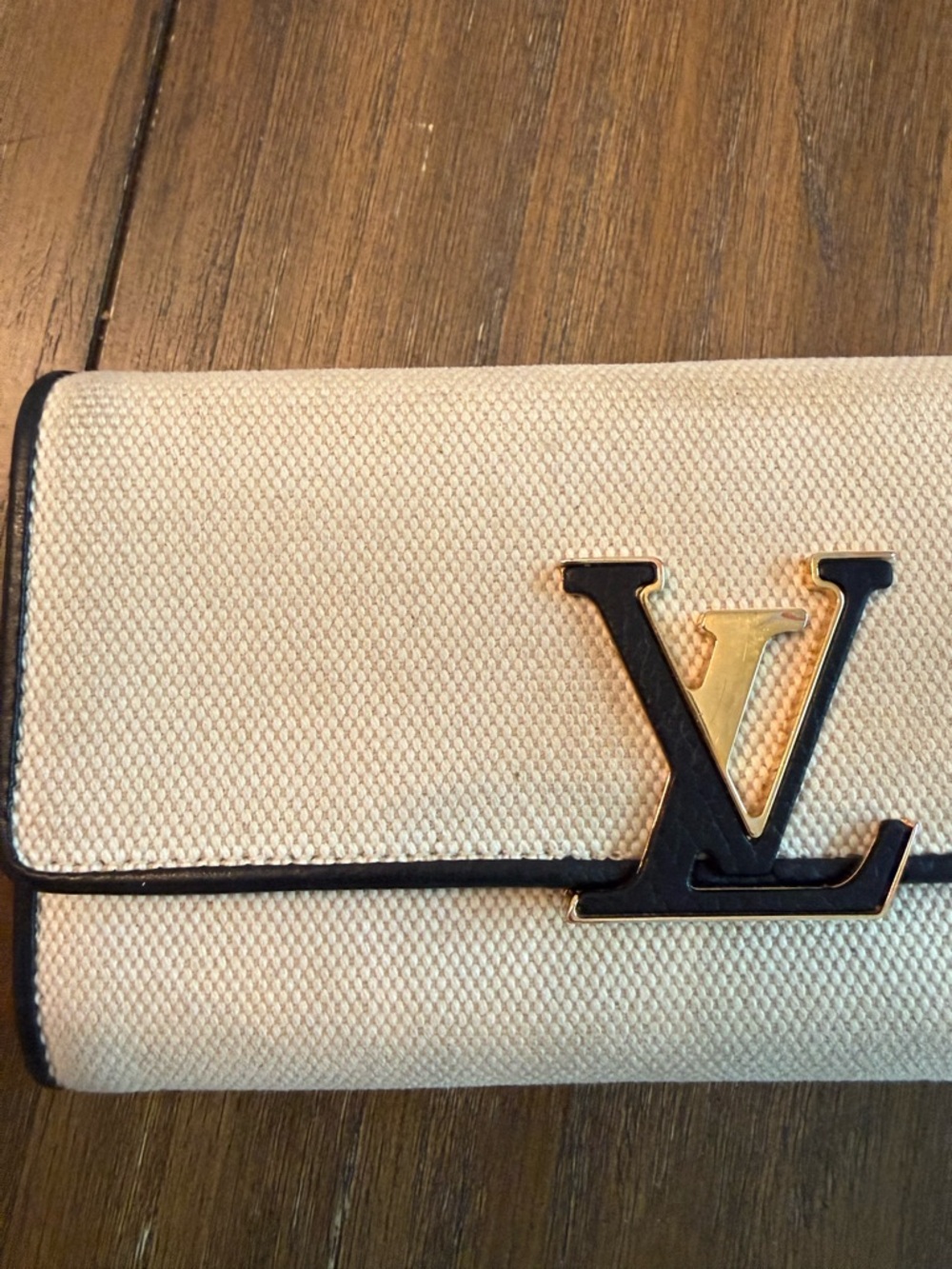 Louis Vuitton Capucines Wallet with Black Trim and Gold LV Emblem - Picture 3 of 10